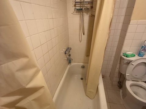 Before home staging of bathroom transformation in Brookline, MA real estate listing