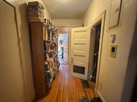 Before home staging of Entryway transformation in Brookline, MA real estate listing