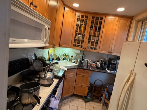Before home staging of kitchen transformation in Brookline, MA real estate listing