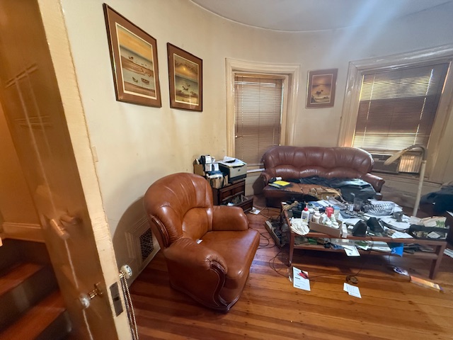 Before home staging of living room transformation in Brookline, MA real estate listing